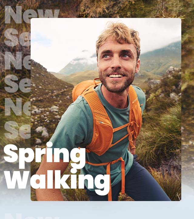 Man wearing a rucksack on a hike