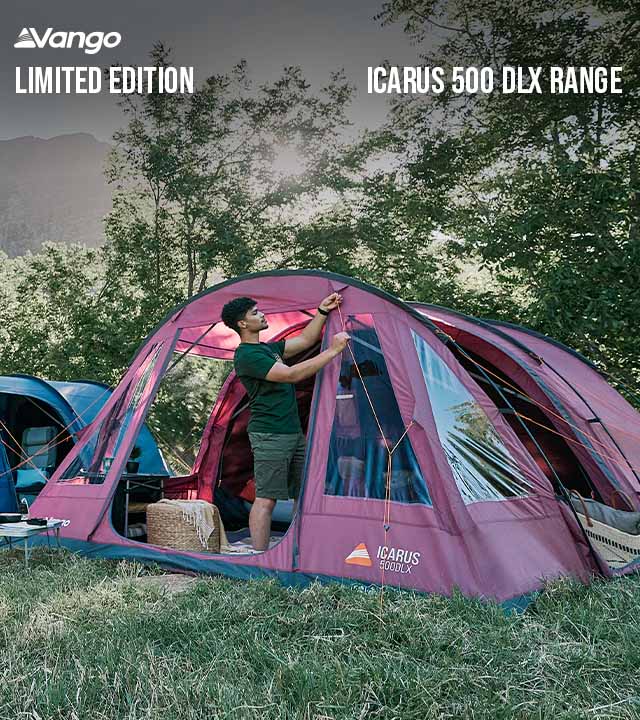Group of friends standing outside a Vango tent