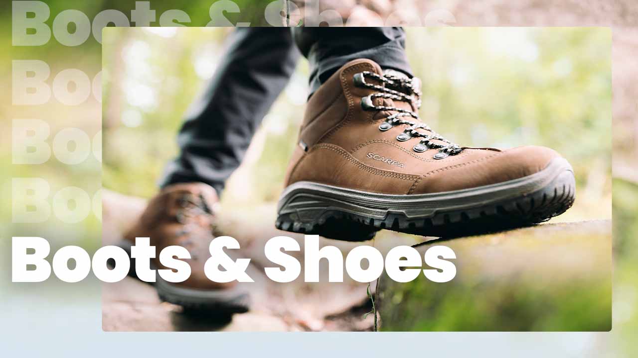 Person wearing hiking boots stepping on a rock