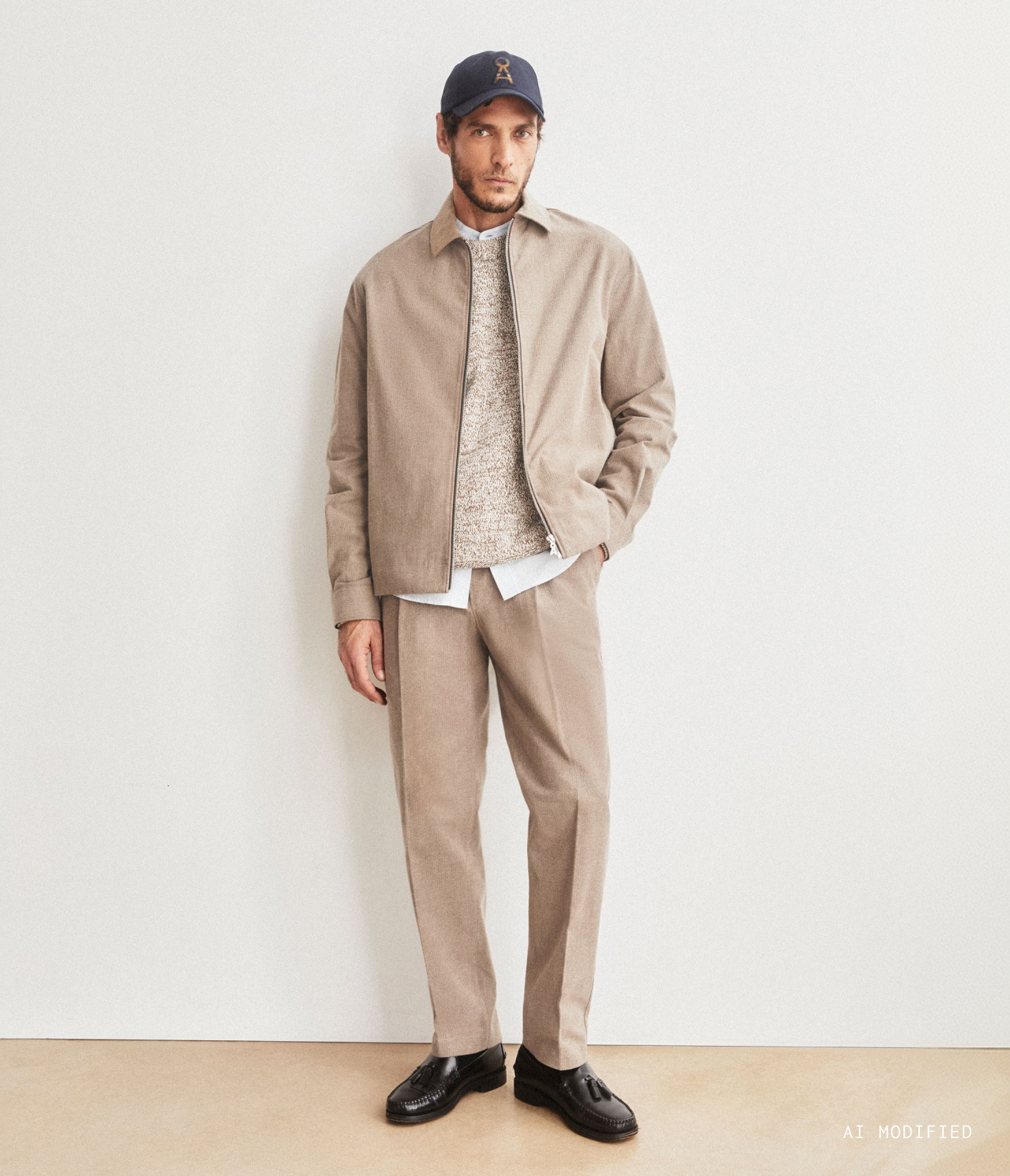 TAAMIR TEXTURED PLEATED TROUSERS