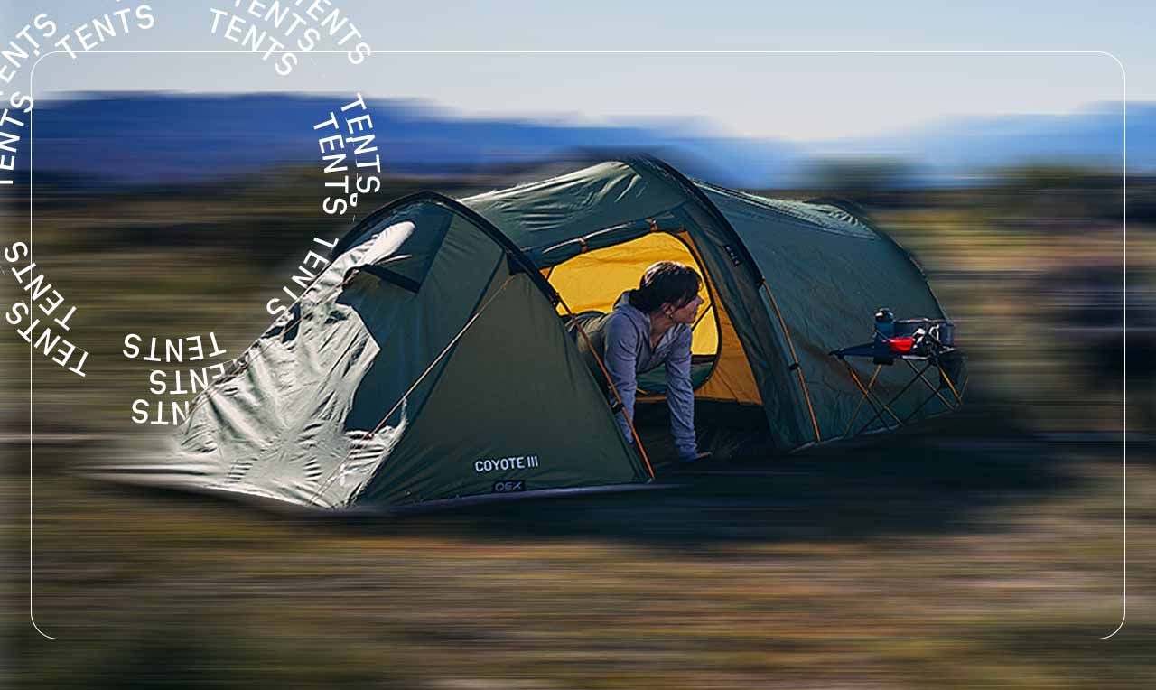 Woman peering out of a backpacking tent