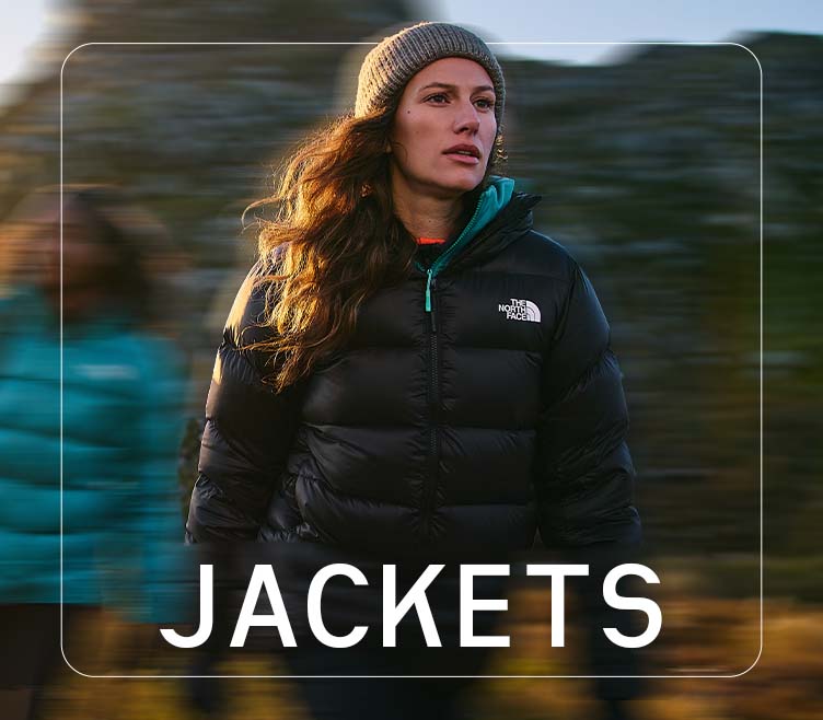 Woman wearing TNF jacket on a walk