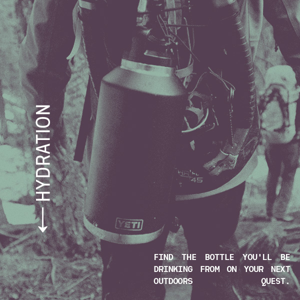 Hiker carrying Yeti flask on backpack