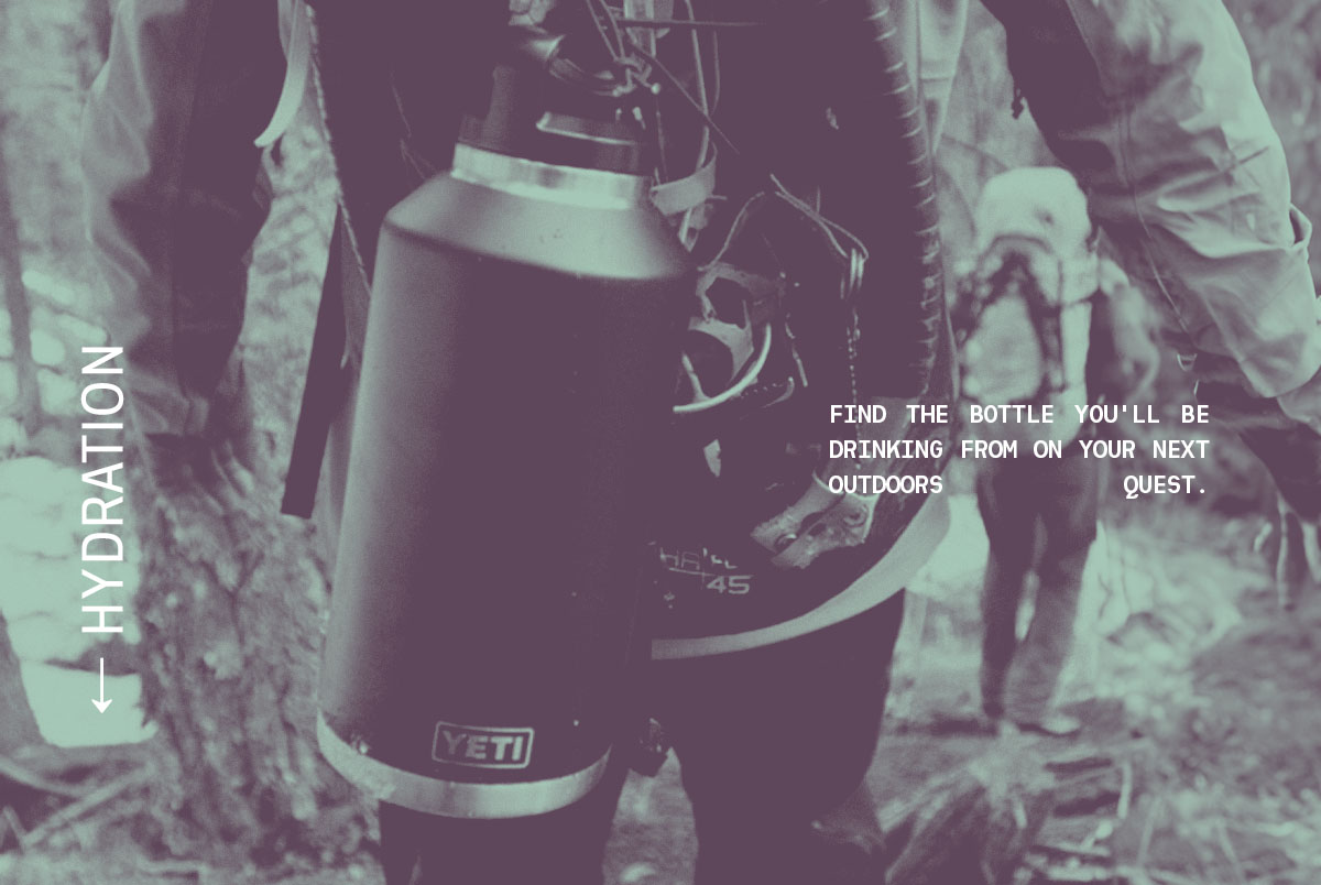 Hiker carrying Yeti flask on backpack