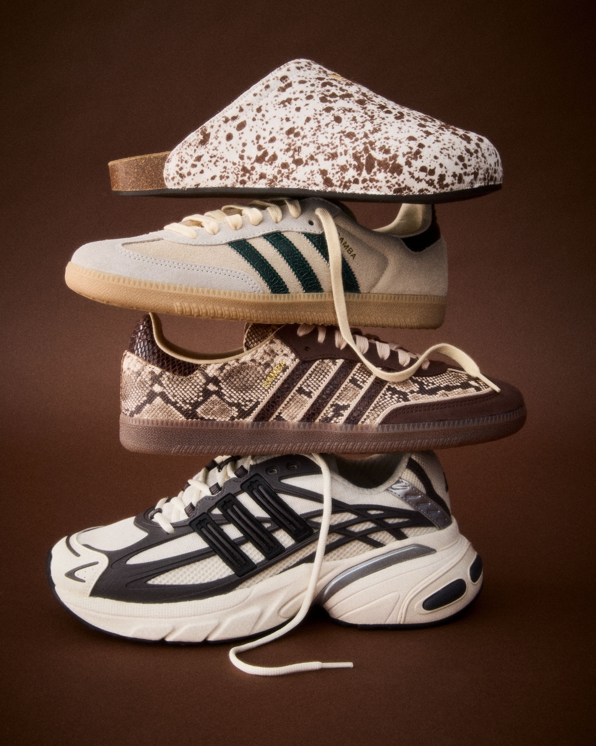 Stack of adidas shoes and sneakers