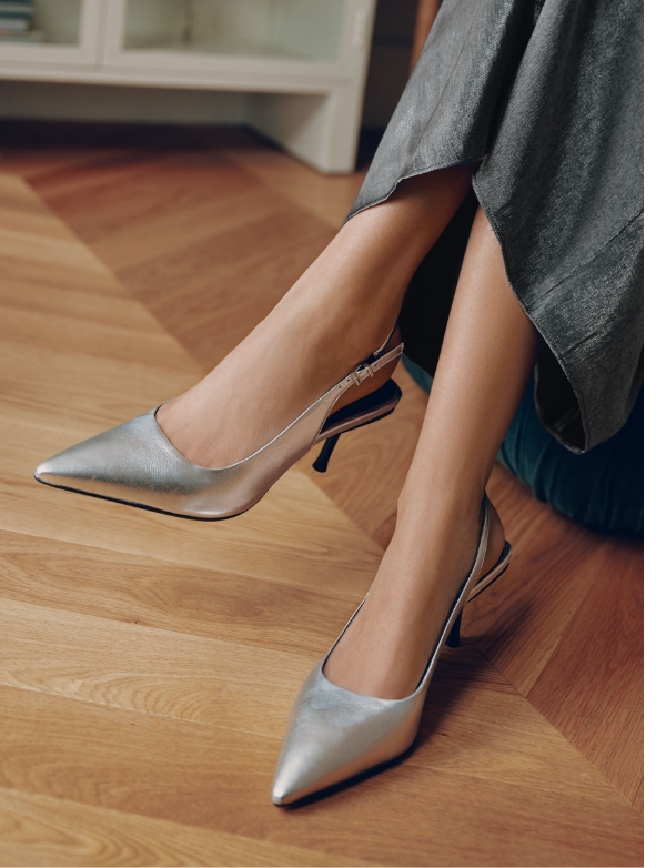 Silver leather slingbacks for women at Simons.