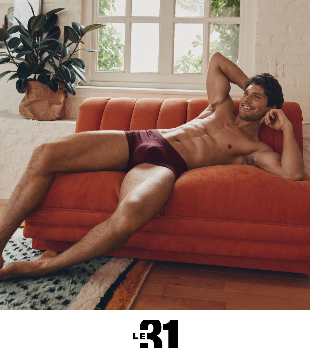 Le 31; Man wearing burgundy trunk