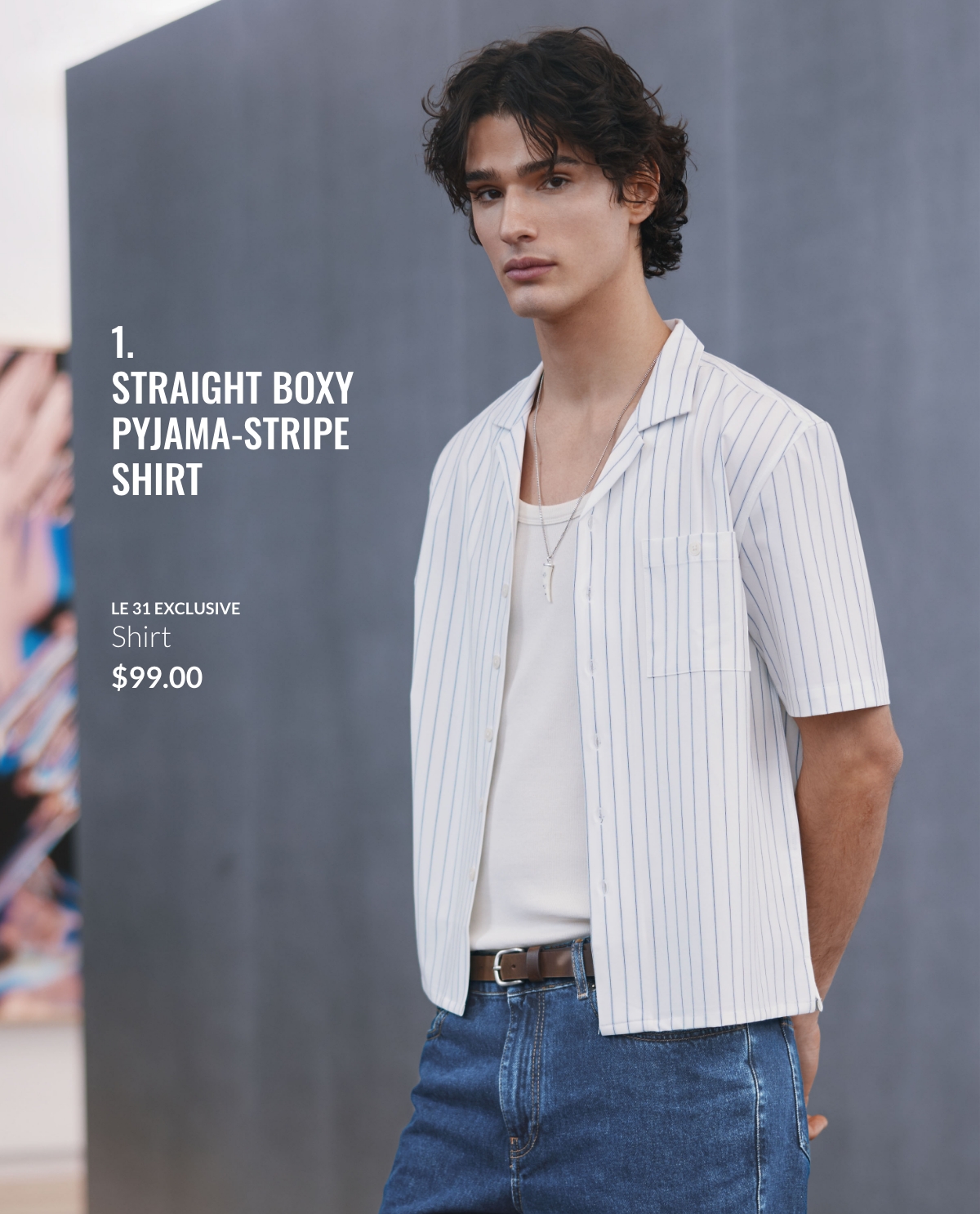 Young man wearing a straight boxy pyjama-stripe shirt at 99.00$