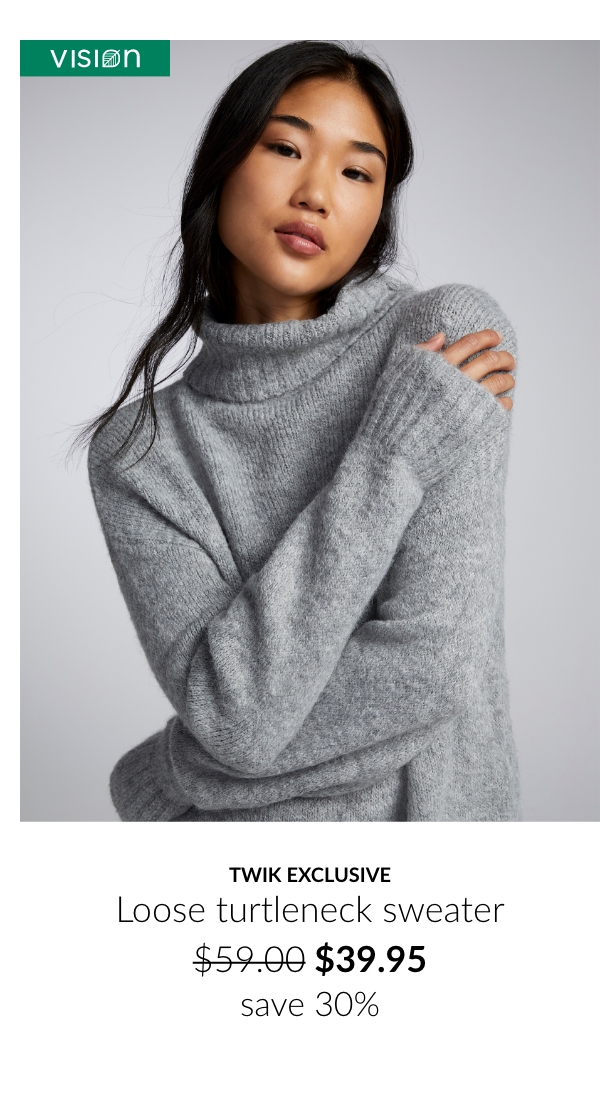 Young woman wearing a grey turtleneck sweater at  $39.95 instead of $59