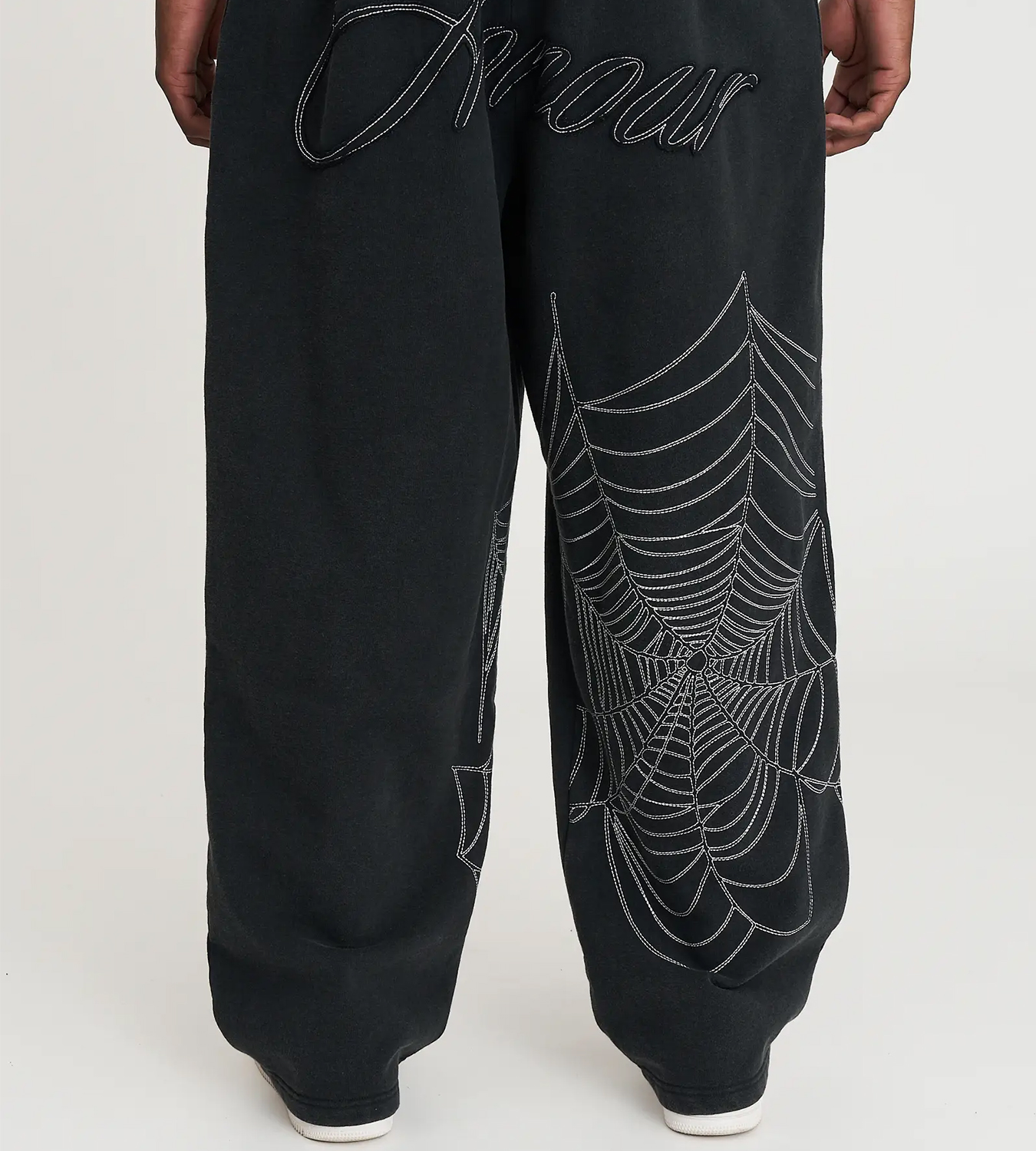 The Cobweb Wide Leg Track Pants in Black.