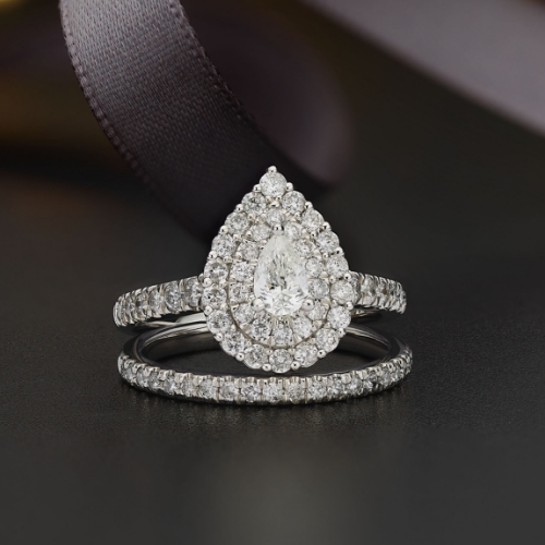 Platinum 1.25ct Diamond Total Pear Shaped Halo Bridal Set