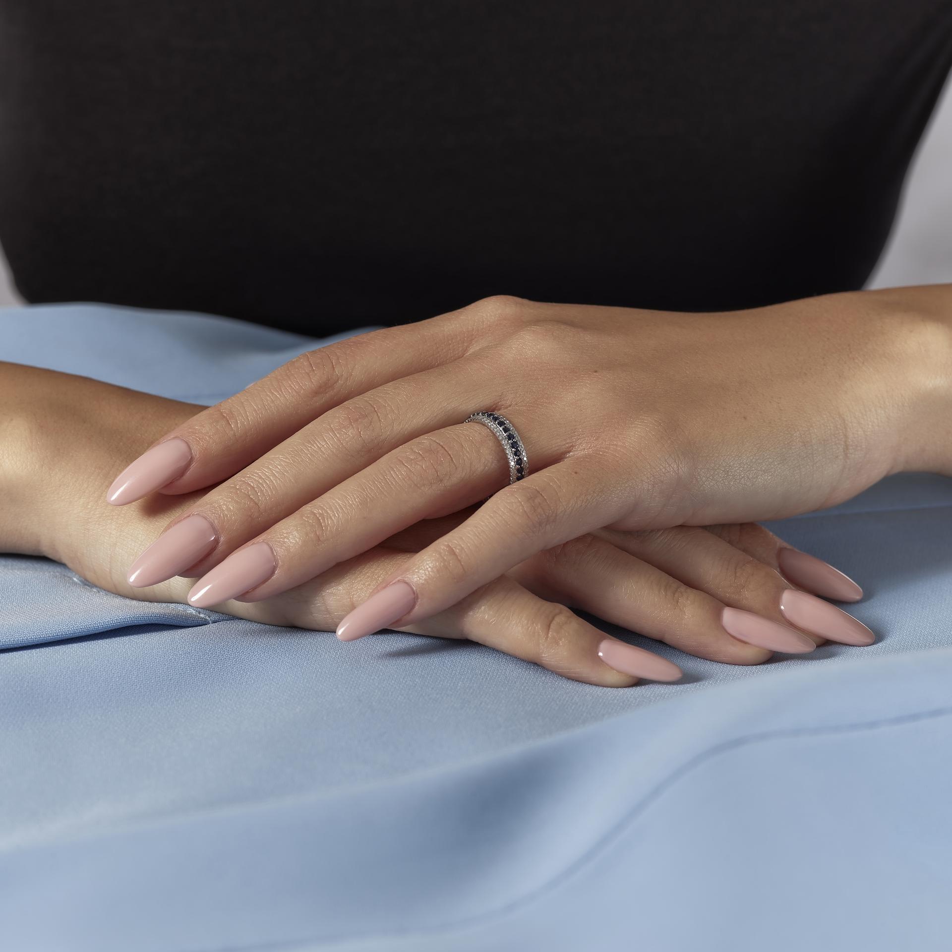 Platinum 0.20ct Diamond & Blue Sapphire Eternity Ring