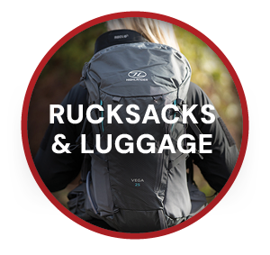RUCKSACKS & LUGGAGE. A woman walks on the trail wearing Highlander Women's Vega 25L Rucksack in Grey. 