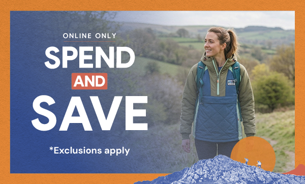 ONLINE ONLY SPEND AND SAVE *Exclusions apply. A woman walks in the hills wearing Passenger Women's Ocean Insulated 1/2 Zip Jacket in Green/Navy. 
