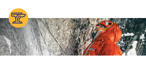 A mountain climber ascends a sheer rock face. On the left, a blue graphic of an anvil in a yellow circle. 