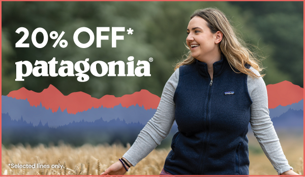 20% OFF* PATAGONIA. *Selected Lines Only. A man looks out at a blue sky, wearing Patagonia Men's P6 Logo Responsibili-Tee T-Shirt in white.