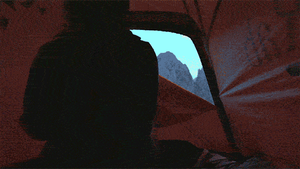A short gif of two runners. They awake in a tent and pick up a Rab pack, before running through a mountain range. The closing shot is them reaching the summit of a mountain as the sun sets, Rab logo overlaid over them. 