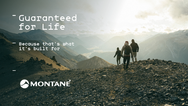 MONTANE. Guaranteed for Life: Because that's what it's built for. Three climbers at the summit of a mountain look over a range. The sun rises ahead of them. 