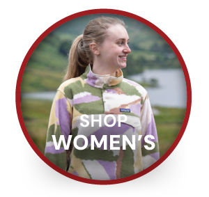 SHOP WOMEN'S. A woman wearing Patagonia Women's Lightweight Synchilla Snap-T Pullover in Cream/Green.