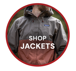 SHOP JACKETS. A man wearing Patagonia Men's Torrentshell 3L Rain Jacket in Brown.