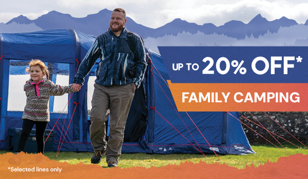 UP TO 20% OFF FAMILY CAMPING* *Selected lines only. A man and his daughter walk hand-in-hand away from a Berghaus Air 600 Nightfall 6-Person Poled Tent in blue.