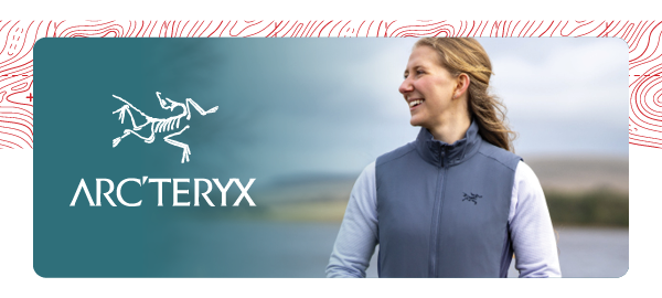 ARC'TERYX. A woman wears Arc'teryx Women's Atom Vest in DK Stratus