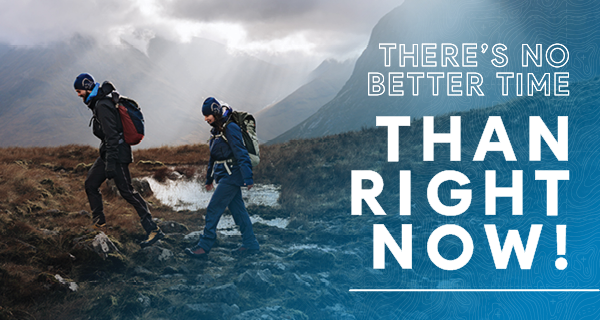 THERE'S NO BETTER TIME THAN RIGHT NOW! A man and a woman hike through a glen. 