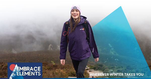 EMBRACE THE ELEMENTS: WHEREVER WINTER TAKES YOU. Image depicts a woman hiking, wearing a waterproof jacket in purple, hiking trousers in black and a beanie in pink. 
