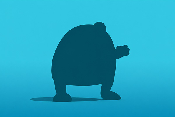 A mystery silhouette of a Jellycat against a blue background