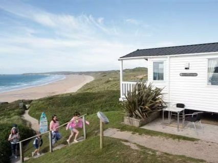 Family walking to their caravan