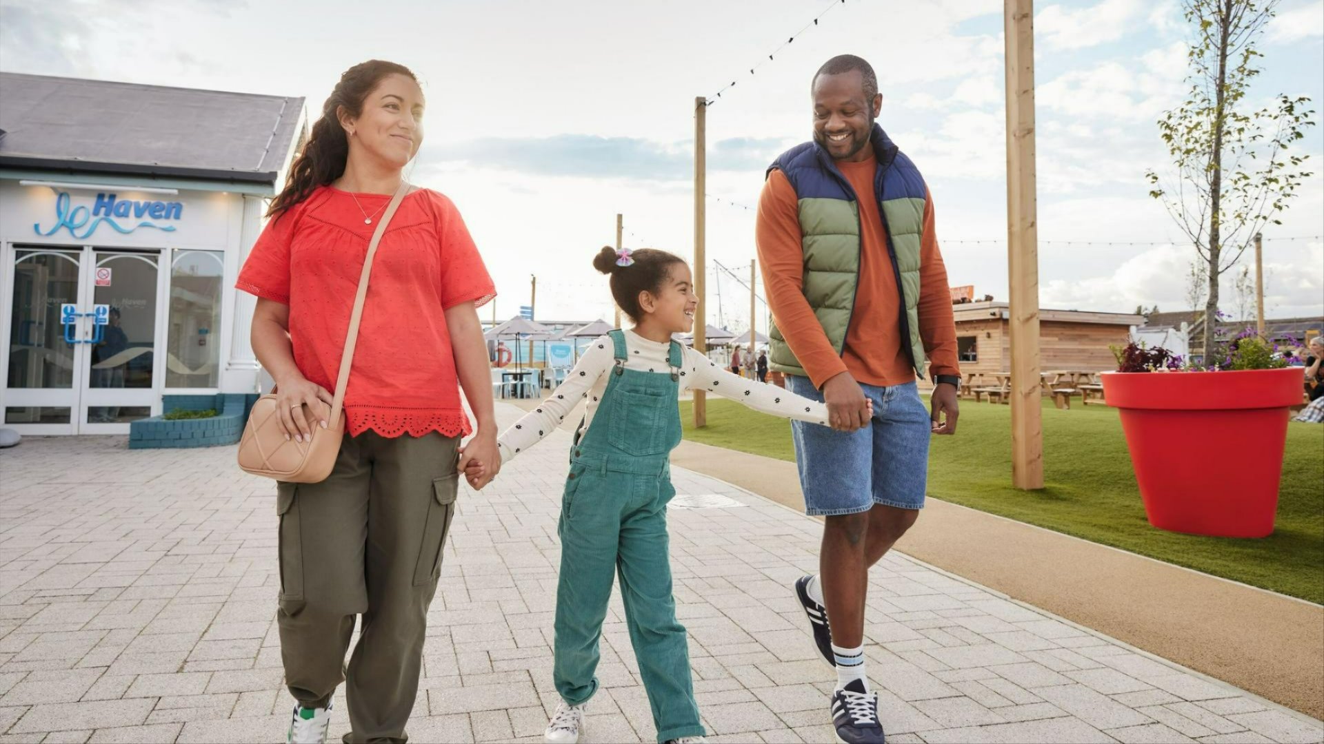 Family walking around a Haven park