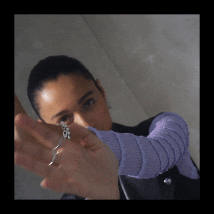 GIF of Model dancing with Pandora Me jewellery