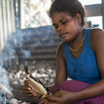 Photo: A woman cooks reef fish on hot coals, Fumato'o, Malaita Province, Solomon Islands. Photo by Filip Milovac for WorldFish.