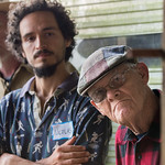 U.S. Air Force Veteran James Marry, right, watches and listens to a demonstration and talk about farming business and the basics of grading sheep during From Service to Stewardship a two-day workshop in Remington, Va., on Friday, May 20, 2016. The Livestock Conservancy, Virginia Cooperative Extension, and Lakota Ranch, are holding this workshop to help educate military service veterans about rare breed animal and poultry options for farming enterprises.  Some of the topics include, getting started, networking, marketing, poultry processing, breeding, husbandry, scything, rotational grazing and pasture management, tractor selections, milking and oxen, and electric fence building.  In 2014, the U.S. Department of Agriculture announced the availability of more than $9 million in outreach and technical assistance for minority farmers and ranchers and military veterans that are new to farming and ranching. The funding, provided through the Outreach and Assistance for Socially Disadvantaged Farmers and Ranchers and Veteran Farmers and Ranchers Program, also known as the 2501 Program, will enable community-based organizations and other partners to work directly with these groups to successfully acquire, own and operate farms and ranches and equitably participate in all USDA programs. The 2014 Farm Bill reauthorized the program and expanded targeted communities.  For more information please see: www.usda.gov/wps/portal/usda/usdamediafb?contentid=2014/0... USDA Media by Lance Cheung.