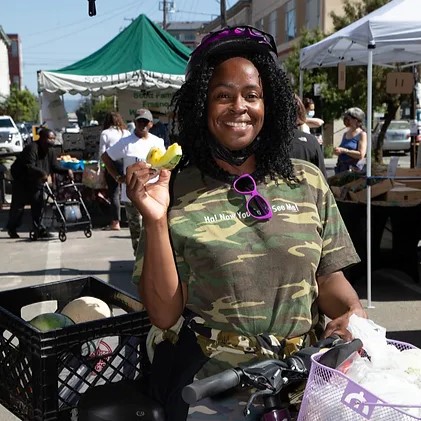 From the gallery of Farms To Grow, LLC: A shopper at a Farms to Grow market, July 2021.