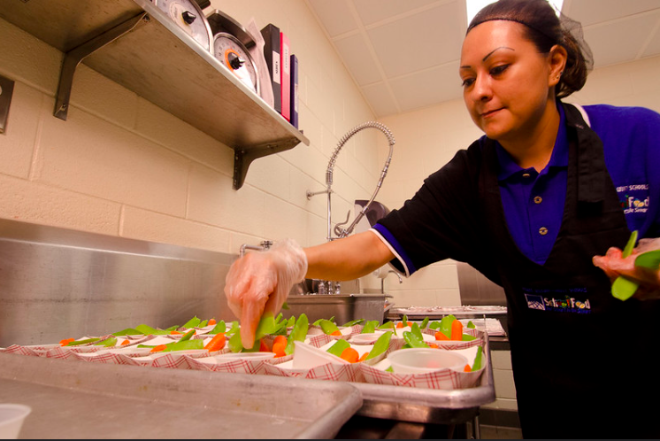 School lunch staff and students enjoy the new school lunch menu created to meet the new standards at the Yorkshire Elementary School in Manassas, VA on Friday, Sept. 7, 2012. USDA photo by Lance Cheung.
