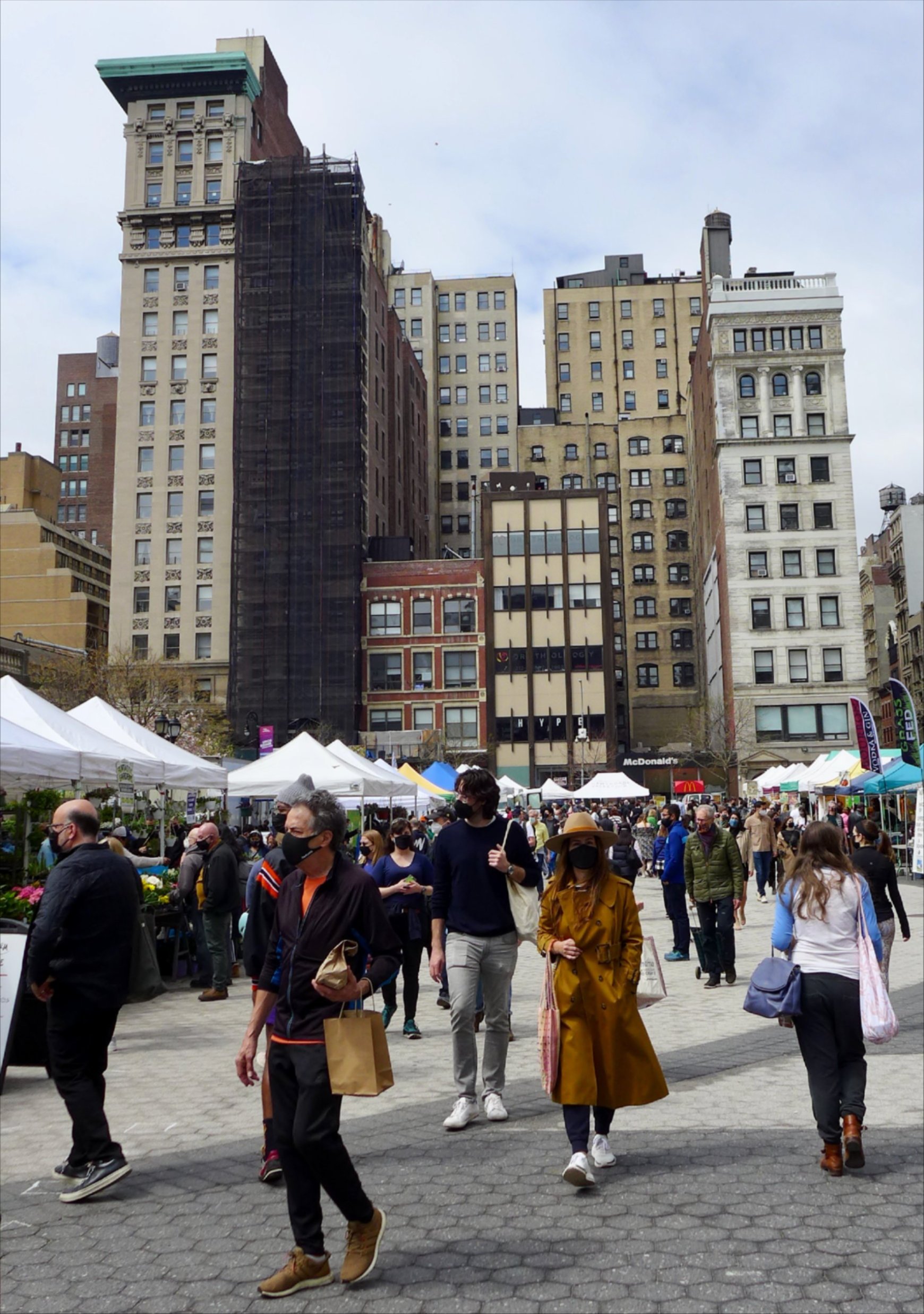 Shoppers at Union Square Greenmarket in New York City in 2021, by Flickr user Peter Burka.