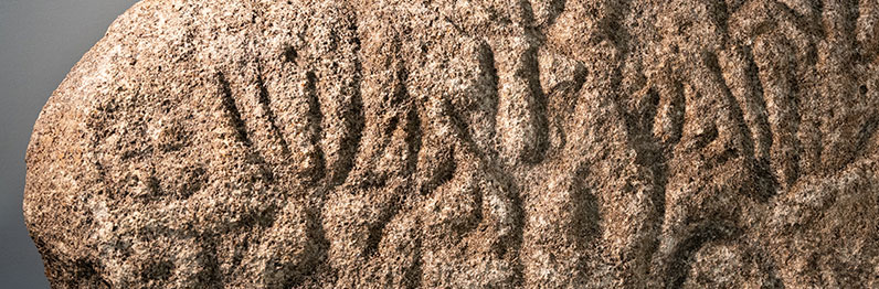 Native American petroglyph on boulder