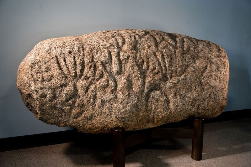 Native American petroglyph on boulder