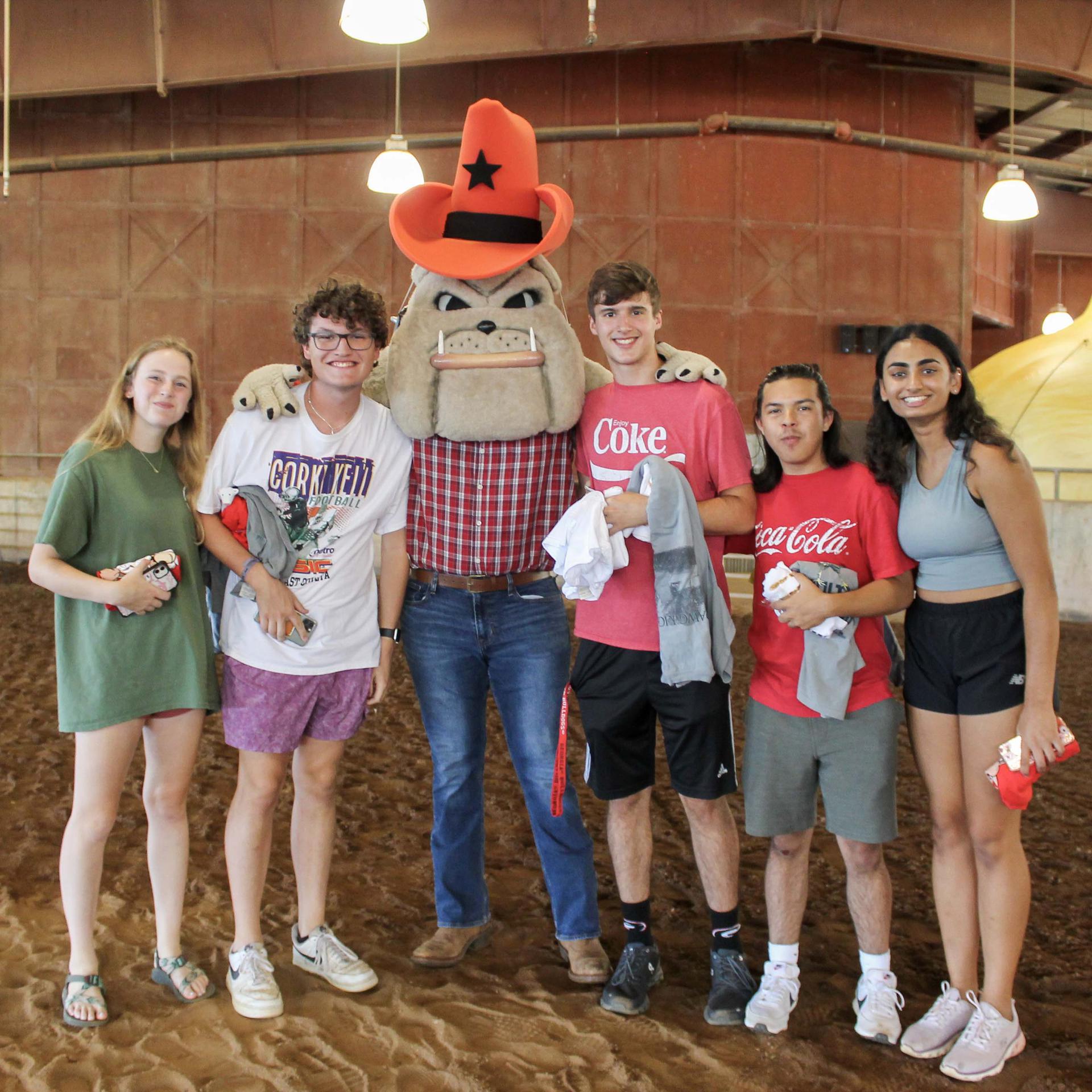 Five students with Hairy Dawg at Ag Dawg Kickoff