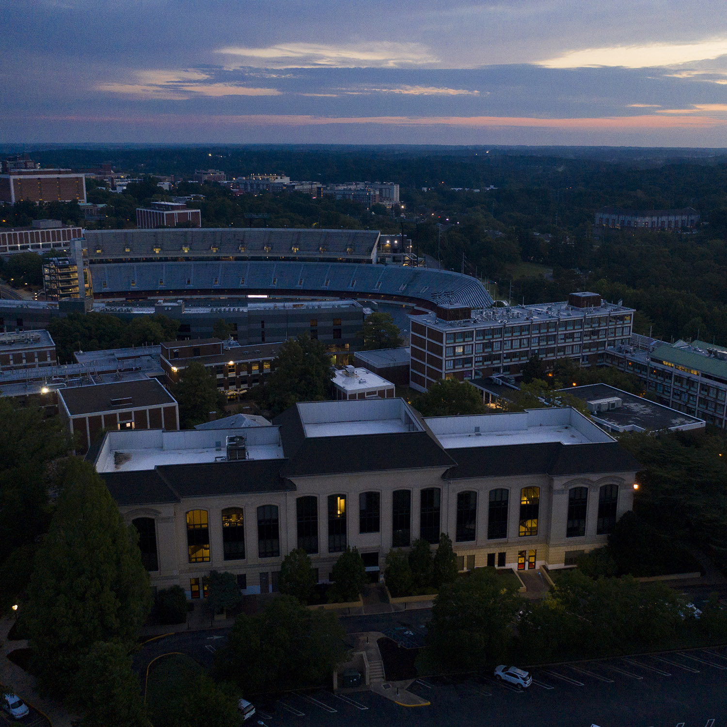 Sunrise aerial photo of Connor Hall with Sanford Stadium in the background