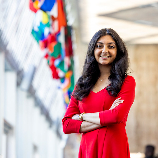 Ashni Patel poses in a hallway at the United Nations.