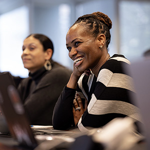 An adult student laughing in class