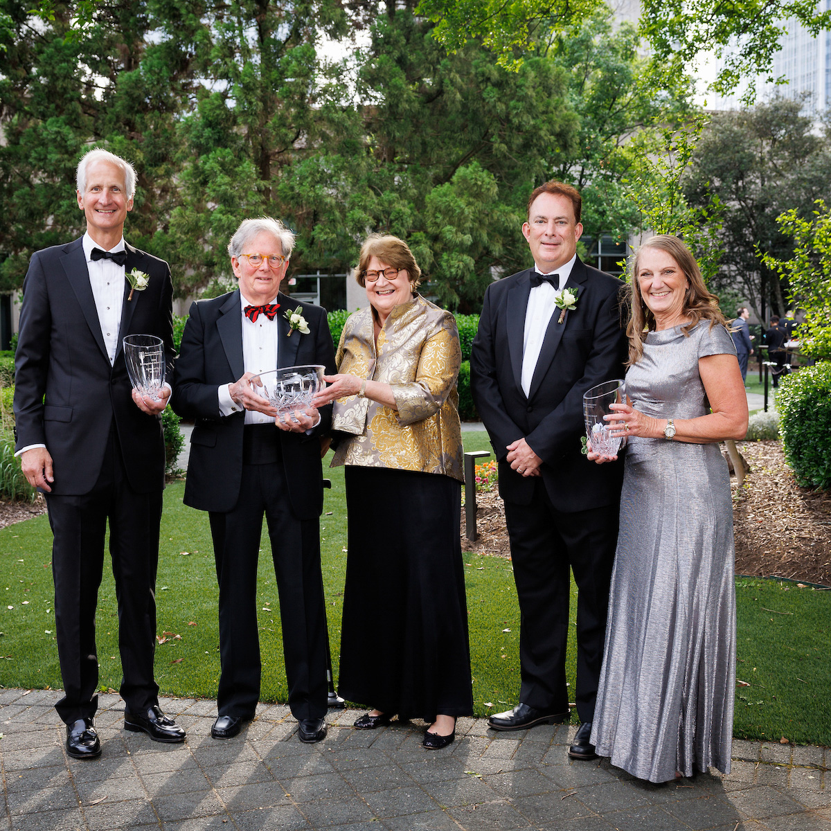 From left: Howard Young, John Godfrey, Flavel Godfrey and Carol Yancey pose in formal dress with their awards 