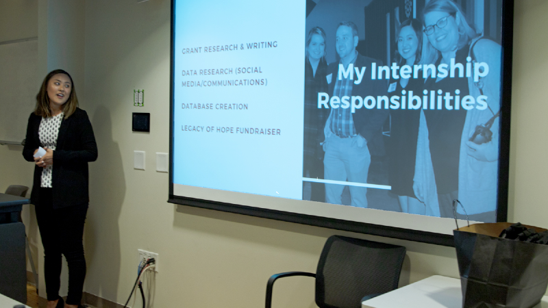 Leslie Hitson, MA NML '19, give her capstone presentation, May 2019